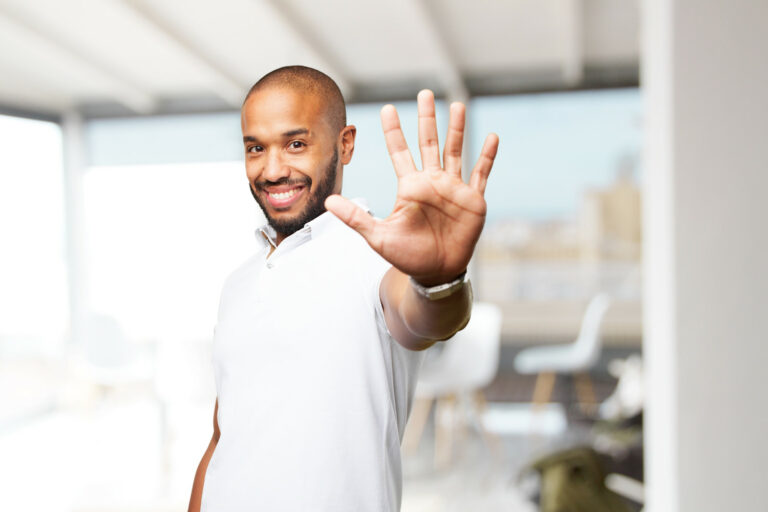 black businessman happy expression 
5 fingers up